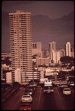 ON H-1 (OR LUNALILO) FREEWAY LOOKING WEST TOWARD DOWNTOWN HONOLULU. TALLEST BUILDING IS NEW "TOWN HOUSE."