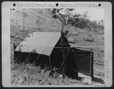 The medics built this latrine for the 38th Bomb Group, 823rd Bomb Sqdn., at Port Moresby, Papua, New Guinea. December 1943. (U.S. Air Force Number A61245AC)