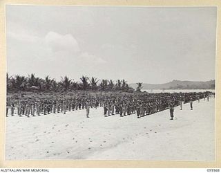 WUNUNG, JACQUINOT BAY, NEW BRITAIN, 1945-08-28. A FULL PARADE OF 37/52 INFANTRY BATTALION AND 29/46 INFANTRY BATTALION, BOTH OF 4 BRIGADE, WAS HELD ON WUNUNG AIRSTRIP. THIS PARADE WAS TO PREPARE ..