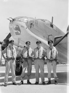 TADJI NEAR AITAPE, NORTH EAST NEW GUINEA. C. 1944-10. INFORMAL PORTRAIT OF FOUR MEMBERS OF NO. 8 (BEAUFORT) SQUADRON RAAF IN FRONT OF THEIR BEAUFORT BOMBER AIRCRAFT