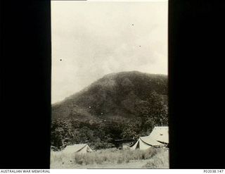 Kokoda Trail, Papua. c.1942-12. Tent lines of No. 5 Casualty Clearing Station at the base of Mount Howbroun. (Original housed in AWM Archive Store)