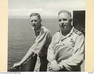 SEK ISLAND, NEW GUINEA. 1944-04-27. TWO BROTHERS WHO ARE SERVING OFFICERS ABOARD THE CORVETTE HMAS BUNDABERG. IDENTIFIED PERSONNEL ARE:- LIEUTENANT COMMANDER N.B. PIXLEY (1); COMMANDER N.S. PIXLEY ..