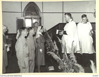 1943-04-01. FIRST SERVICE WEDDING CEREMONY TO BE HELD AT PORT MORESBY. THE WEDDING TOOK PLACE AT THE CHURCH OF ST. JOHN. LEFT TO RIGHT - CAPT. H.I. MCKENZIE OF SYDNEY, (BEST MAN) LIEUT. F.B. BRAY ..