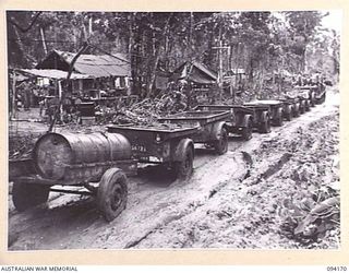 BOUGAINVILLE. 1945-07-18. A JAPANESE PRIME MOVER, USED FOR TOWING ARTILLERY PIECES THREE WEEKS AGO, WHICH WAS CAPTURED AT MAMAGOTA JUNCTION AND OVERHAULED BY 312 LIGHT AID DETACHMENT. IT IS NOW ..