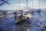 Indonesia, outrigger fishing boats in harbor off Ambon Island