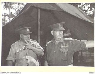 RABAUL, NEW BRITAIN. 1945-10-27. GENERAL SIR THOMAS A. BLAMEY, COMMANDER-IN-CHIEF, ALLIED LAND FORCES, SOUTH WEST PACIFIC AREA, TALKING TO COLONEL J.J. BLACK, COMMANDING OFFICER 118 GENERAL ..