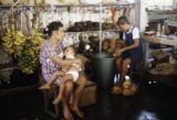 French Polynesia, merchant selling goods at Papeete market