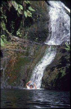 Woman in waterfall, Rarotonga