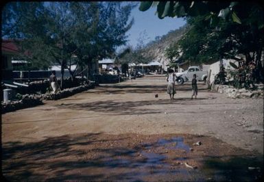 Road to Ela Beach Hospital, car on the right : Port Moresby, Papua New Guinea, 1953 / Terence and Margaret Spencer