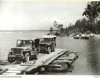 BOUGAINVILLE, 1944-11-19. THE TARGESSI RIVER, WEST OF THE TOWN ON EMPRESS AUGUSTA BAY. HERE THE HIGH TIDES AND THE EXCESSIVE RAINFALL IN THE CATCHMENT AREA MADE BRIDGE BUILDING IMPOSSIBLE. THE ..
