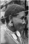 Oiru'a, wearing fio nose pin, 'ausakwalo earsticks, girigwei'a clamshell pendants, kwari'ingari nut and bat-tooth ear ornaments