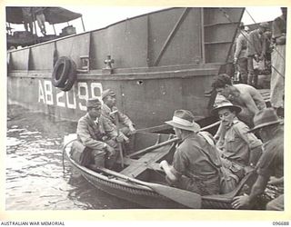 KAIRIRU ISLAND, NEW GUINEA. 1945-09-17. REAR-ADMIRAL S. SATO, FORMER JAPANESE NAVAL COMMANDER OF KAIRIRU AND MUSCHU ISLANDS IN THE DINGHY WHICH TOOK HIM TO RAN MOTOR LAUNCH 809 FOR TRANSFER TO ..