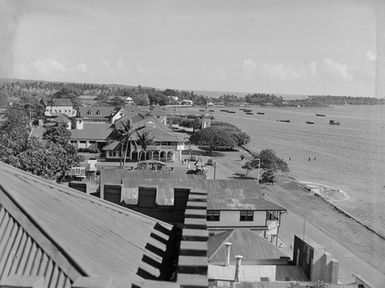 [High angle view of harbour and coastal waterfront buildings]