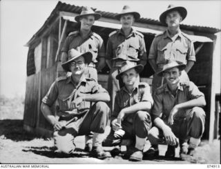 SOUTH ALEXISHAFEN, NEW GUINEA. 1944-07-24. OFFICERS OF NO. 28 BATTERY, 2/14TH FIELD REGIMENT. IDENTIFIED PERSONNEL ARE:- VX40914 CAPTAIN H.C. TRINICK (1); NX58450 LIEUTENANT D.A. CAMERON (2); ..