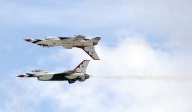 A U.S. Air Force Thunderbirds Aerial Demonstration Team F-16C Fighting Falcon aircraft performs an inverted flight maneuver during a performance for the Open House Air Show, Sept. 12, 2004, at Andersen Air Force Base, Guam. (U.S. Air Force PHOTO by STAFF SGT. Bennie J. Davis III) (Released)