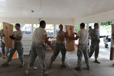 Earthquake ^ Tsunami - Asili, American Samoa, October 7, 2009 -- Teamwork, speed and safety were keys to setting up this supply distribution center in the Village of Asili. In just a week after the tsunami hit te shores of this island community, FEMA has helped American Samo move from response to recovery operations. David Gonzalez/FEMA