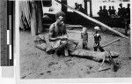 Man carving statues, Solomon Islands, Oceania, 1938