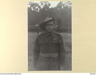 STRATHPINE, QUEENSLAND, AUSTRALIA. 1944-08-14. VX36233 SIGNALMAN W.O. GREEN, MM, 2/4TH FIELD REGIMENT SIGNALS SECTION WHO WON HIS AWARD ON MOUNT PROTHERO IN THE FINNISTERRES DURING THE LAST 7TH ..