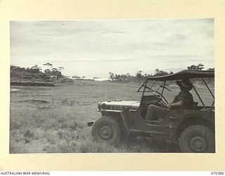 MILNE BAY, NEW GUINEA. 1944-02-12. THE NOW UNUSED TURNBULL AIR STRIP. THIS PHOTOGRAPH IS TAKEN FROM THE WESTERN MOST POINT OF THE JAPANESE ADVANCE WHICH OCCURRED ON THE 30TH AUGUST, 1942. THE FIELD ..