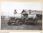 CAPE WOM, NEW GUINEA. 1945-11-14. THE JEEP ESCORT SECTION, 6 DIVISION PROVOST COMPANY. THESE VEHICLES ARE USED TO ESCORT THE GENERAL OFFICER COMMANDING AND ARMY PERSONAGES OF HIGH RANK WHO VISIT ..