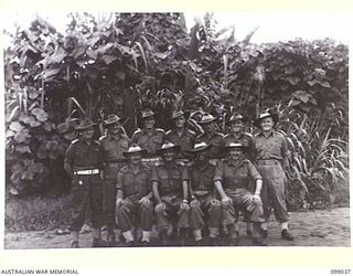 Group portrait of the Officers of 30 Advanced Supply Depot, Australian Army Service Corps. Left to right, back row: QX48881 Lieutenant (Lt) G H F Nichols of Gaythorne, Qld; VX88119 Lt A M Edmonds ..