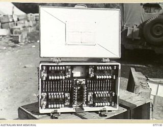 LAE AREA, NEW GUINEA. 1944-11-27. THE DISTRIBUTOR BOARD OF A CAPTURED JAPANESE AIRCRAFT PREDICTOR IN THE MUSEUM OF THE ASSISTANT QUARTERMASTER GENERAL (E), 1ST AUSTRALIAN ARMY