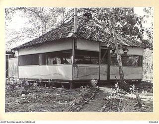 YALU, NEW GUINEA. 1945-08-03. THE QUARTERS OF THE CHIEF INSTRUCTOR AT THE NEW GUINEA TRAINING SCHOOL