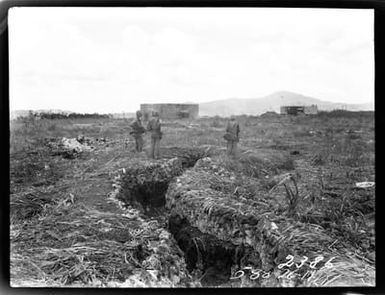 A Group of Marines Seek Out the Japanese From This Network of Trenches on Saipan