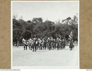 ELA BEACH, NEW GUINEA. 1944-01-01. THE COMPOSITE BAND FROM 21ST AND 25TH INFANTRY BRIGADE WHICH WON THE OPEN BAND CONTEST AT THE ALLIED SERVICES GRAND SPORTS CARNIVAL