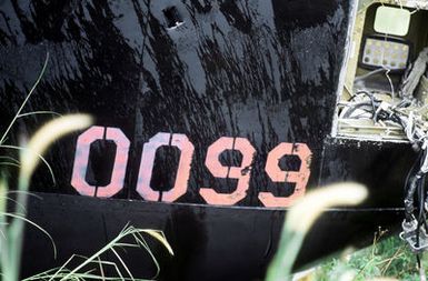 A closeup view of the carcass of a B-52D Stratofortress aircraft, one of three examples of the strategic bomber to be scrapped in accordance with the SALT II treaty between the United States and the Soviet Union, reveals a number stenciled on the fuselage