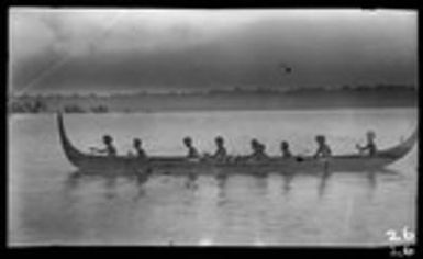 Several men on canoe