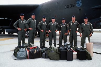 Members of a 60th Bombardment Squadron B-52G Stratofortress aircraft crew preparing to take part in a maritime mission include, from left: Captain (CPT) Russell Bridgham, First Lieutenant (1LT) Rodney Yates, 1LT Peter Grettch, CPT James Hays, 1LT Ian Kincaid, CPT Gregory Sprang and STAFF Sergeant Beau Howard. The mission, performed in conjunction with the Navy, includes carrying AIM-84A Harpoon missiles, sea surveillance and reconnaissance and laying sea mines