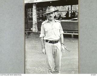 MILNE BAY, NEW GUINEA. 1944-04-06. TX6222 MAJOR D.J. NETTLEFOLD, OFFICER COMMANDING 53RD DEPUTY COMMANDER, ROYAL AUSTRALIAN ENGINEERS