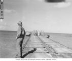 Bikini Scientific Resurvey personnel on a dock at Aomoen Island, summer 1947