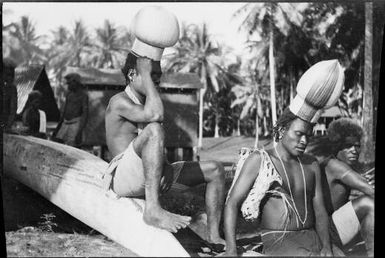 Two men wearing Ombu, ceremonial initiation hats, Soraken, Bougainville Island,  ca. 1929, 2 / Sarah Chinnery