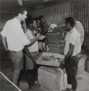 Rocks going into a sample crusher at the big copper mining project at Panguna on Bougainville in the Territory of Papua and New Guinea / Australian Information Service photograph