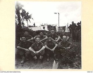 BRANDI, NEW GUINEA, 1945-09-07. MEMBERS OF 35 INFANTRY BATTALION. IDENTIFIED PERSONNEL ARE:- PRIVATE B.J. BUGDEN (1); PTE L. BOURKE (2); PRIVATE B. MOONEY (3); STAFF-SERGEANT W.P. MURRARY (4); ..