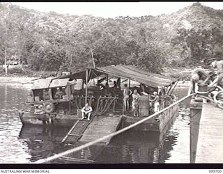 RABAUL, NEW BRITAIN, 1946-01-30. A PREFABRICATED FLOATING DOCK, 400 TONS, WAS ASSEMBLED BY 13 WATER TRANSPORT WORKSHOPS, CORPS OF AUSTRALIAN ELECTRICAL AND MECHANICAL ENGINEERS, AT RABAUL. PARTS ..