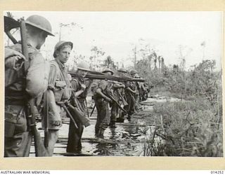 1943-01-27. PAPUA. ALLIED ADVANCE ON SANANANDA. WATER, MUD AND SLUSH ARE ALMOST THE ALLIED TROOPS INSEPARABLE COMPANIONS IN PAPUA. FOR WEEKS THE ALLIES HAVE BEEN ADVANCING, SOMETIMES UP TO THEIR ..