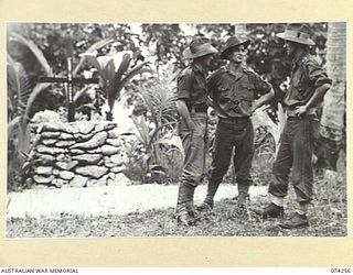 SIAR, NEW GUINEA. 1944-06-23. VX108710 CORPORAL G.C. PHILLIPS (1); VX84582 WARRANT OFFICER II, M.J. SAINSBERY (2) AND VX104114 CHAPLAIN G.T. SAMBELL (3); ALL OF THE 57/60TH INFANTRY BATTALION, ..