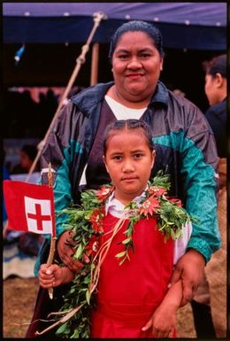 Woman and girl with Tongan flag,Tonga