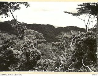 ILOLO - KOKODA, NEW GUINEA. 1944-04-30. THE IMITA RIDGE AND TRAIL VIEWED FROM IORIBAIWA VILLAGE WHERE THE JAPANESE ONCE POSITIONED THEIR HEADQUARTERS