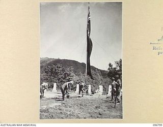 RABAUL, NEW BRITAIN, 1945-09-15. JAPANESE TROOPS ARE BEING USED TO PREPARE CAMP SITES FOR HQ 11 DIVISION AND 4 INFANTRY BRIGADE. SHOWN SOME OF THE HUNDRED JAPANESE SOLDIERS AT WORK IN THE RUINS OF ..