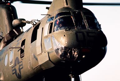 A CH-46E Sea Knight helicopter from Marine Medium Helicopter Squadron 261 approaches for a landing aboard the amphibious assault ship USS GUAM (LPH-9) during Operations off the coast of Lebanon