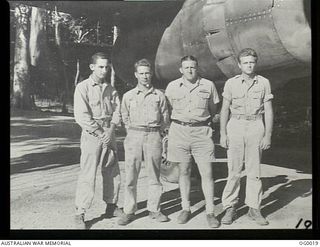 PORT MORESBY, PAPUA. C. 1943. RAAF AND USA AIRMEN WHO FLY TOGETHER AS THE CREW OF AN AMERICAN B-25 MITCHELL BOMBER AIRCRAFT. LEFT TO RIGHT: STAFF SERGEANT (S SGT) C. H. MAUPIN, GUNNER, USA; S SGT ..