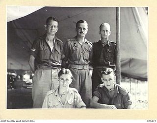 MALMAL VILLAGE, NEW BRITAIN. 1945-03-02. MEMBERS OF THE STAFF OF THE ASSISTANT DIRECTOR OF MEDICAL SERVICES, 5TH DIVISION. IDENTIFIED PERSONNEL ARE:- VX60110 SERGEANT A.W. CAMERON (1); QX48801 ..