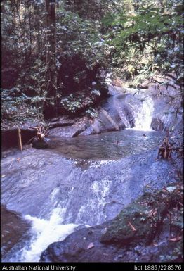 An idyllic rainforest bathing pool in solid rock in the bed of a minor tributary of the Liddle (Dogomo) River near Bulong longhouse