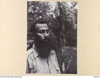 KURURAI YAMA, NEW BRITAIN. 1945-09-17. JEM M.D. YUSOUF, A LIBERATED PRISONER OF WAR AT THE INDIAN PRISONER OF WAR CAMP. HE WAS SEVERELY BEATEN FOR DISOBEYING A TRIVIAL JAPANESE ORDER