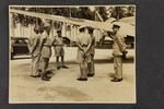 Lieutenant Commander Hugh Cave and group in uniform