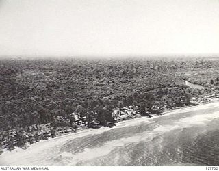 TOKO, BOUGAINVILLE ISLAND. 1945.07. AERIAL PHOTOGRAPH OF AREA OCCUPIED BY HEADQUARTERS, 3RD AUSTRALIAN DIVISION, AND THE DIVISIONAL FORWARD MAINTENANCE AREA, TAKEN BY NO. 5 SQUADRON, RAAF